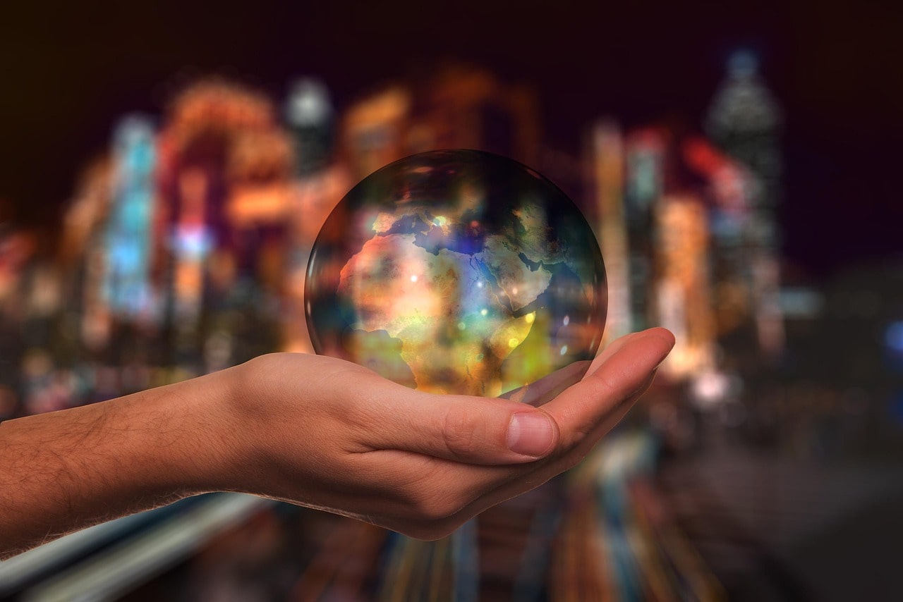 Starting a Podcast Hand Holding a Globe
